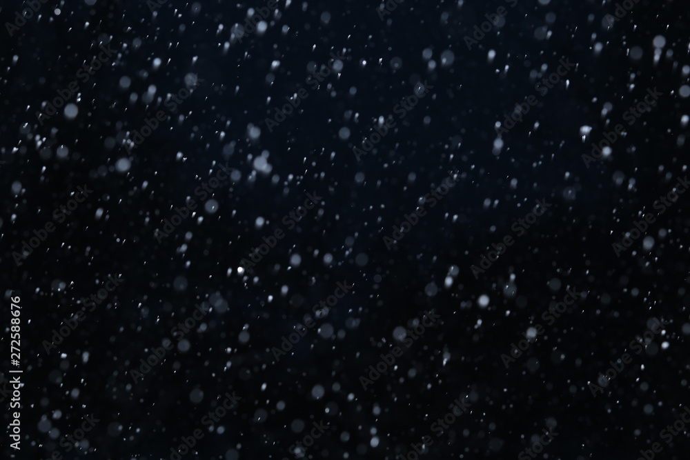 snow on a black background