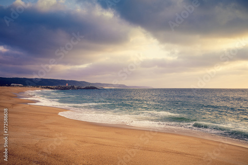 Sunset over the sea. Atlantic ocean in the evening. Nazare, Portugal, Europe © vvvita