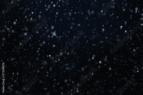 snow on a black background