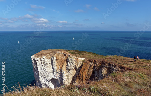 Etretat coastal path and Manneporte cliff in Normandy coast photo