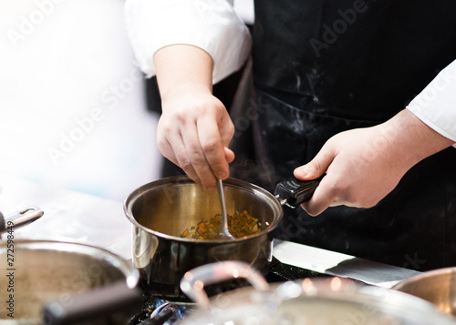 Chef cooking food in the kitchen  Chef preparing food