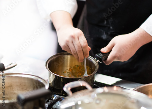 Chef cooking food in the kitchen, Chef preparing food