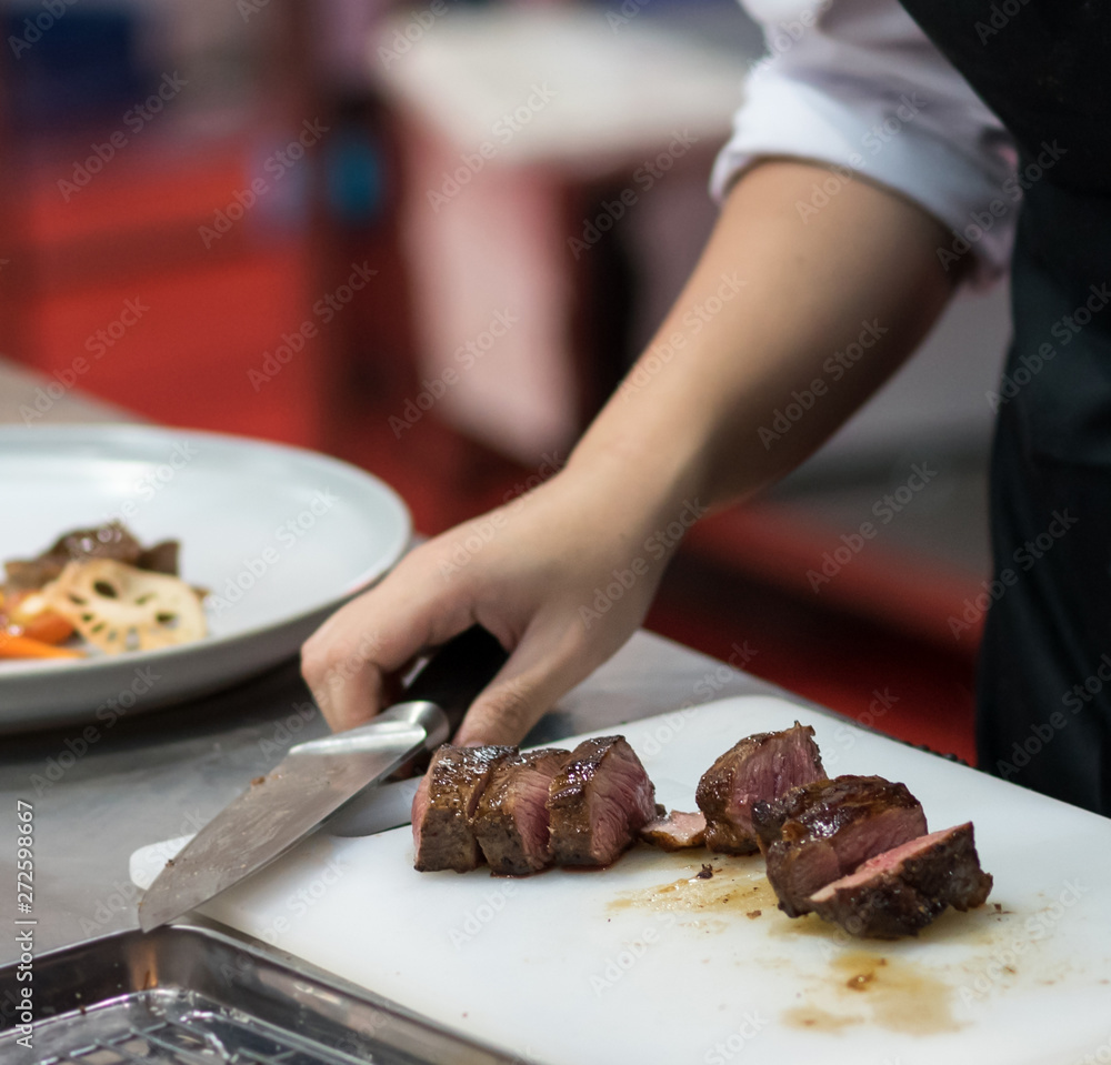 Chef cooking food in the kitchen, Chef preparing food Chef cooking food in the kitchen, Chef preparing food