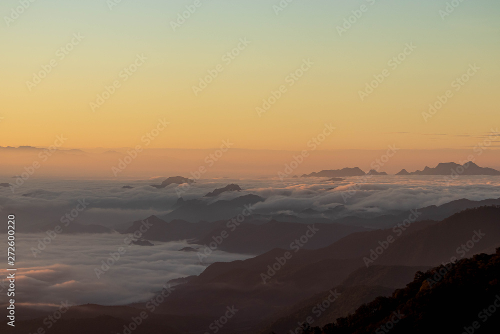 Obraz premium Landscape clouds in mountain valley during sunrise, Doi Ang Khang, Chiang mai