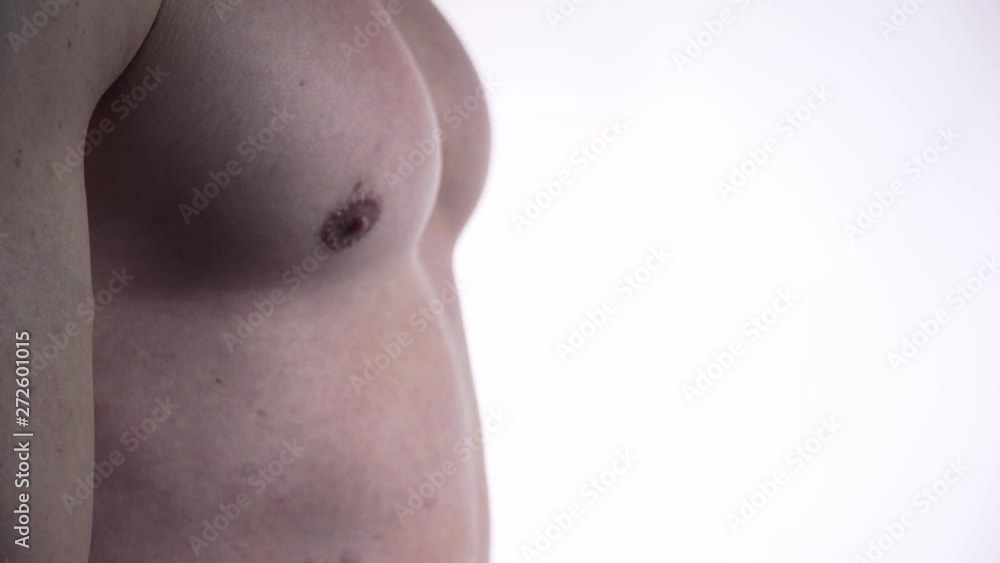 Close up of a man flexing his chest muscles in 4k Close up of a man flexing his chest muscles in 4k