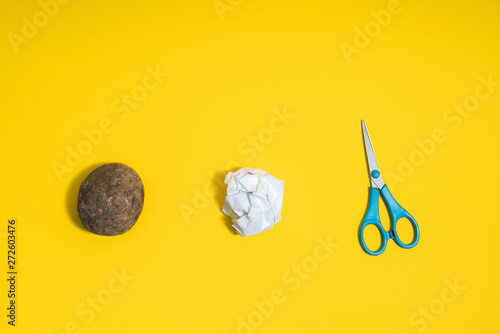 Фотография Rock, paper, scissors concept. Choice, decision making. Top abov
