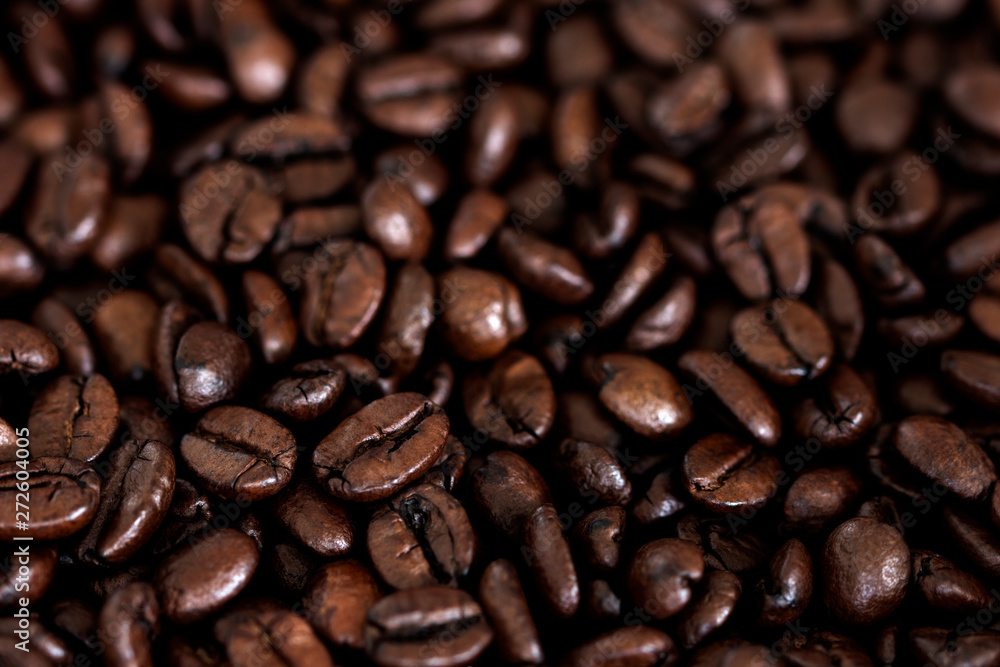 Selective focus photo of roasted coffee beans background. Selective focus photo of roasted coffee beans background.
