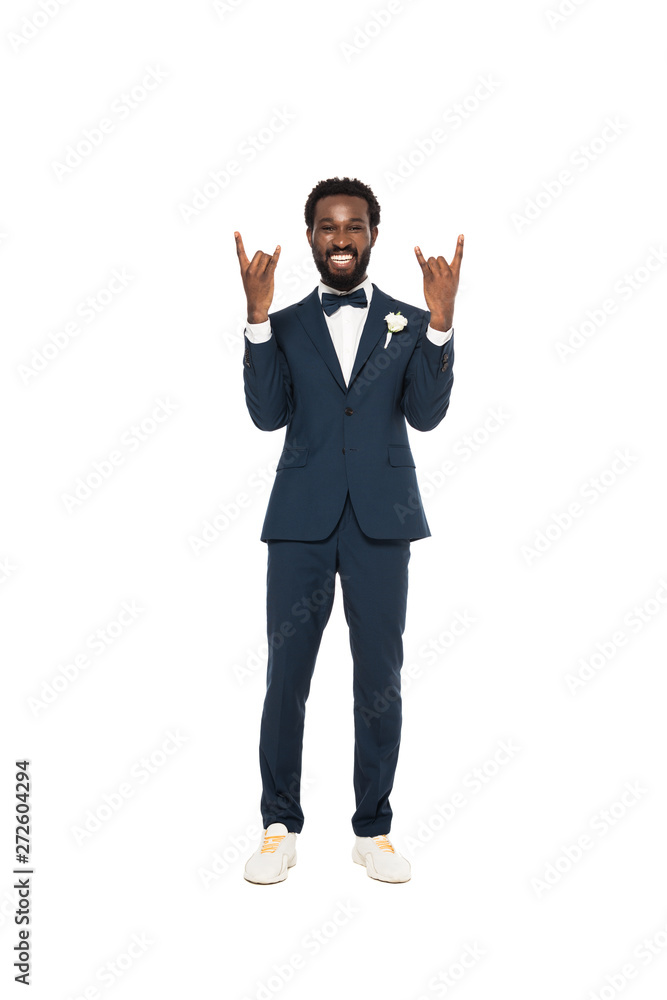 happy african american man in suit showing rock sign isolated on white happy african american man in suit showing rock sign isolated on white