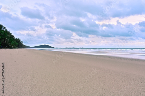  The beach on the bright blue sky Waves and wind On vacation and travel