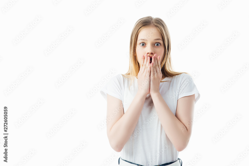 shocked teenage girl with hands near mouth isolated on white shocked teenage girl with hands near mouth isolated on white