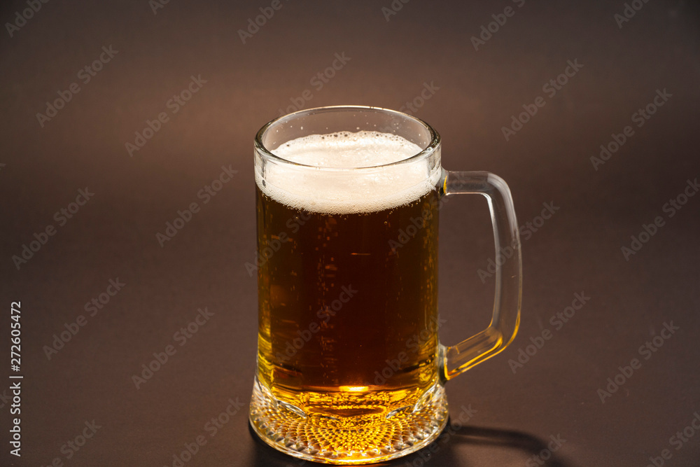 Bright, cold beer in a glass of glass