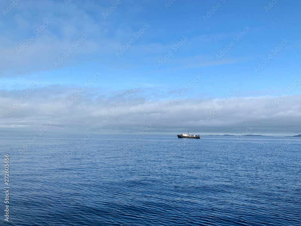 Ussuriysky Bay of Japanese sea in cloudy summer day. Russia, Vladivostok