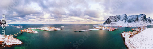 Arctic natural landscape. Panoramic view of village Reine on Lofotens in Norway, Scandinavia, Europe. Eye-popping panorama of authentic fishing village on Lofoten Islands Archipelago in Norway.