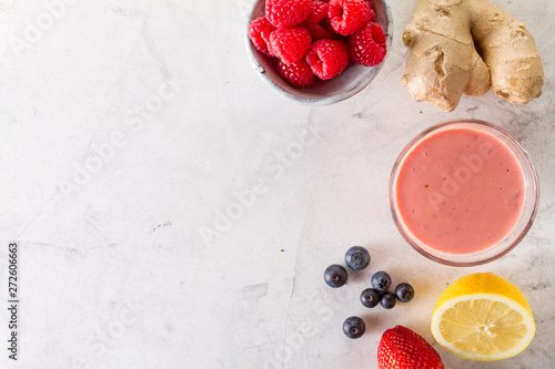 Fresh red smoothie with rapsberries photo