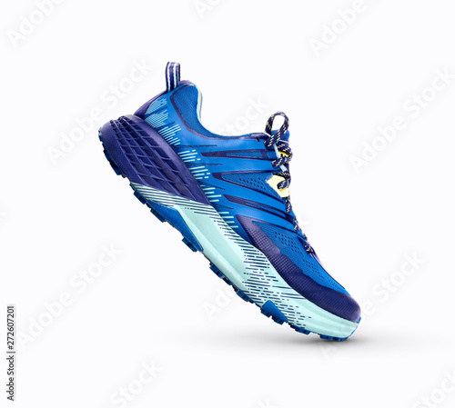 Obraz na płótnie A side view of Blue Trainers Isolated on a white background. w salonie