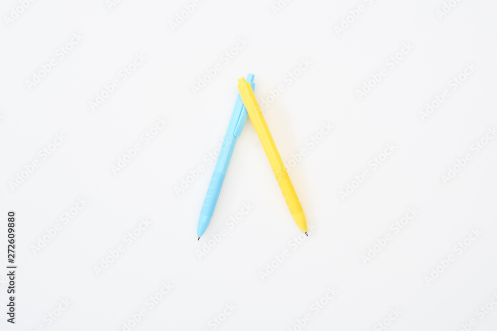 top view of yellow and blue pencils isolated on white top view of yellow and blue pencils isolated on white