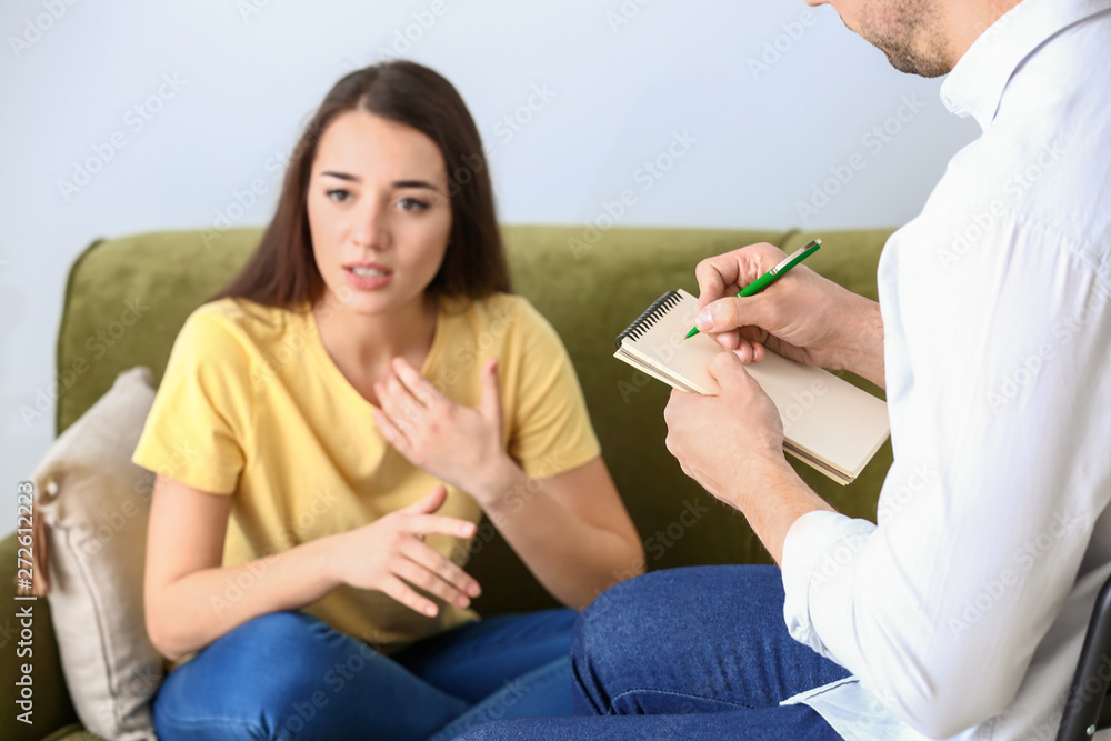 Psychologist working with woman in office Psychologist working with woman in office