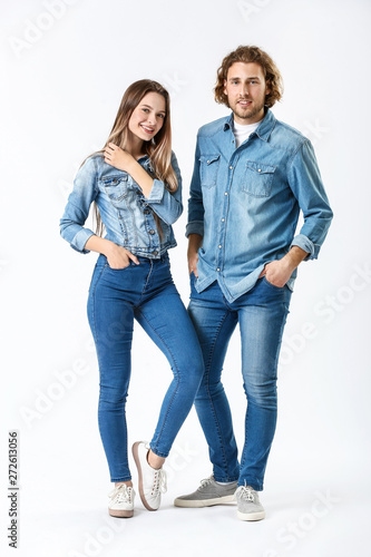 Stylish young couple in jea...