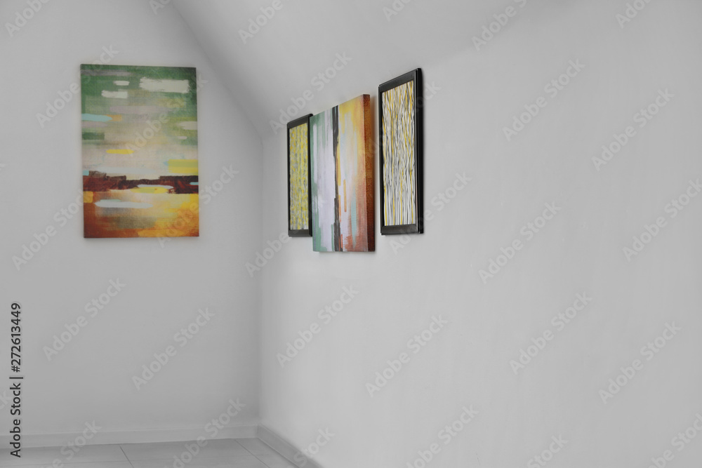 Fototapeta premium Pictures on wall in modern art gallery