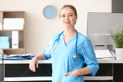 Young medical assistant in ...