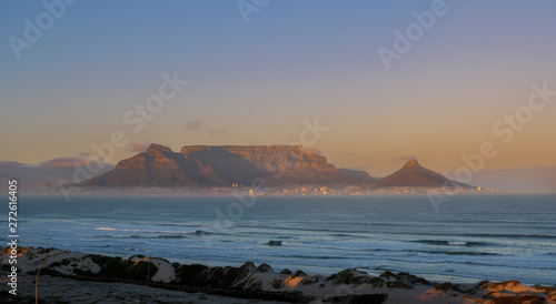 Table Bay, Cape Town, Table Mountain, Devil's Peak and Lion's Head from Blouberg at sunrise. Cape Town . Western Cape. South Africa