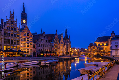 View of Graslei  Korenlei quays and Leie river in the historic city center in Ghent  Gent   Belgium. Architecture and landmark of Ghent. Night cityscape of Ghent.