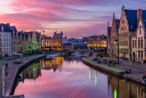 View of Graslei  Korenlei quays and Leie river in the historic city center in Ghent  Gent   Belgium. Architecture and landmark of Ghent. Sunset cityscape of Ghent.