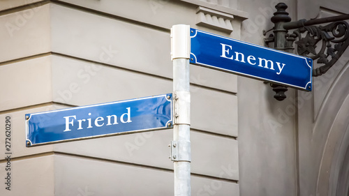 Canvas-taulu Street Sign to Friend versus Enemy