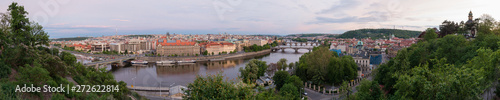 Panoramic view of river Vltava and Prague bridges at dusk. Scenic view from Letna Hill, Czech Republic © ventura