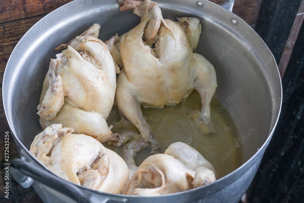 The steamed Hainanese chicken rice in Thai called khao Mun Kai delicious Asian food The steamed Hainanese chicken rice in Thai called khao Mun Kai delicious Asian food