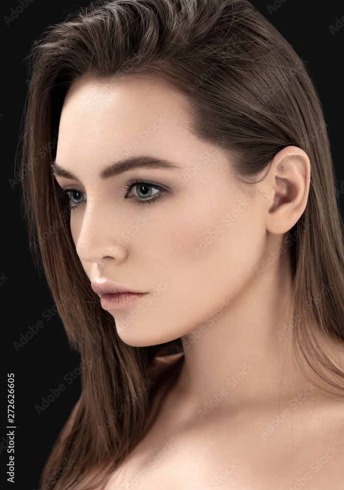 Alluring serious brunette on black Alluring serious brunette on black