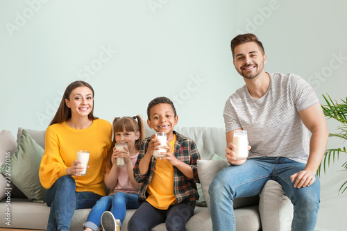 Young family with glasses o...