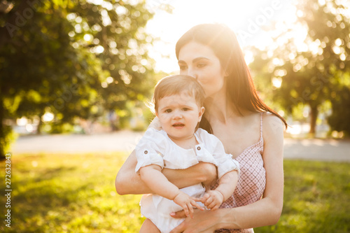 Portrait of mother and baby in the summer 