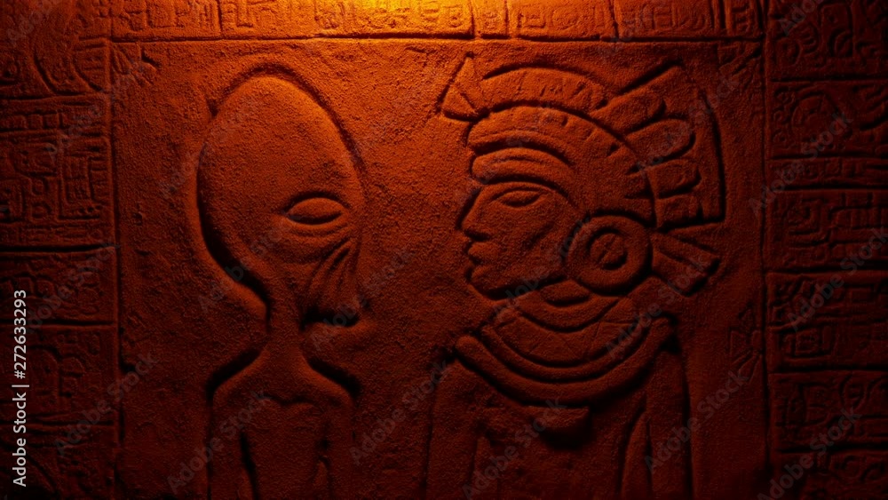 Fire Lights Alien And Aztec Man In Wall Carving Fire Lights Alien And Aztec Man In Wall Carving