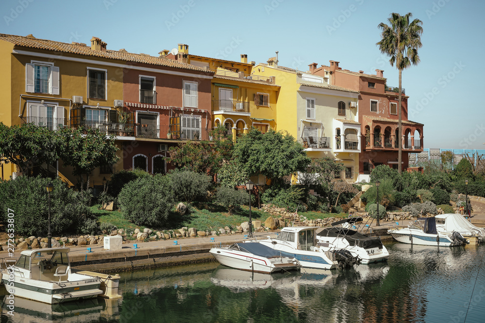 Colorful houses and boats at Saplaya Port Alboraya Valencia Spain