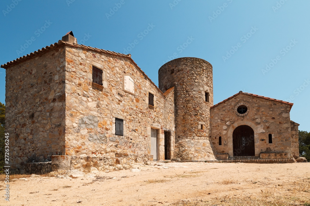 Chapel and tower of Santa Barbara. Costa Brava, Catalonia, Spain.