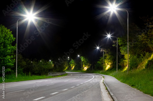 night street with modern led street lights in small city photo