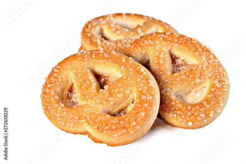 Pretzel shaped butter cookies isolated on white background