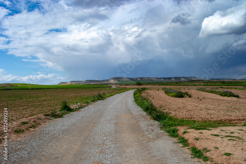 Beautiful storm landscape surroundings of Zaragoza rain rainbow and horizon hills