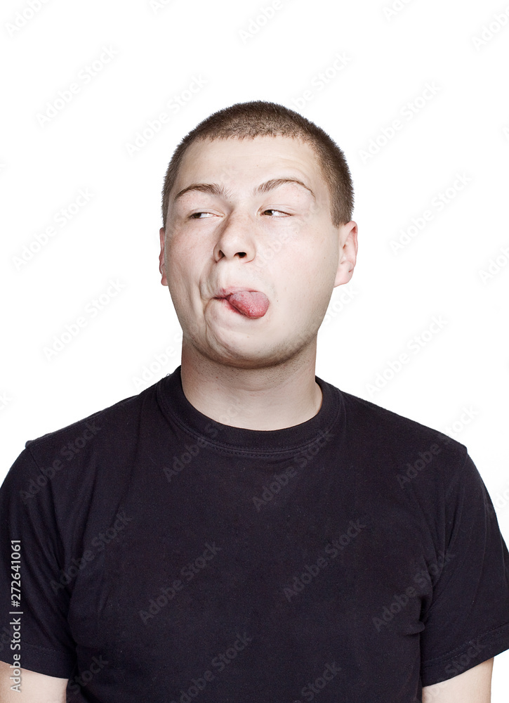Portrait of young man. Facial expression. surprise with tongue face. Portrait of young man. Facial expression. surprise with tongue face.