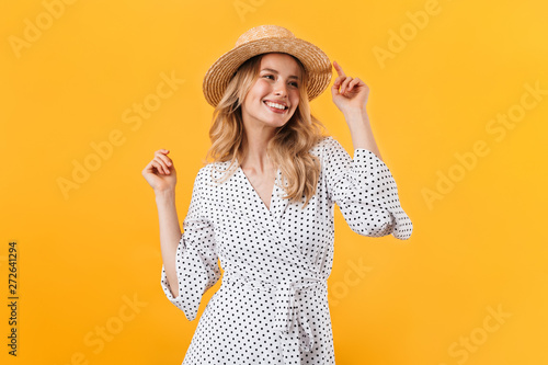 Beautiful young blonde woman wearing summer dress