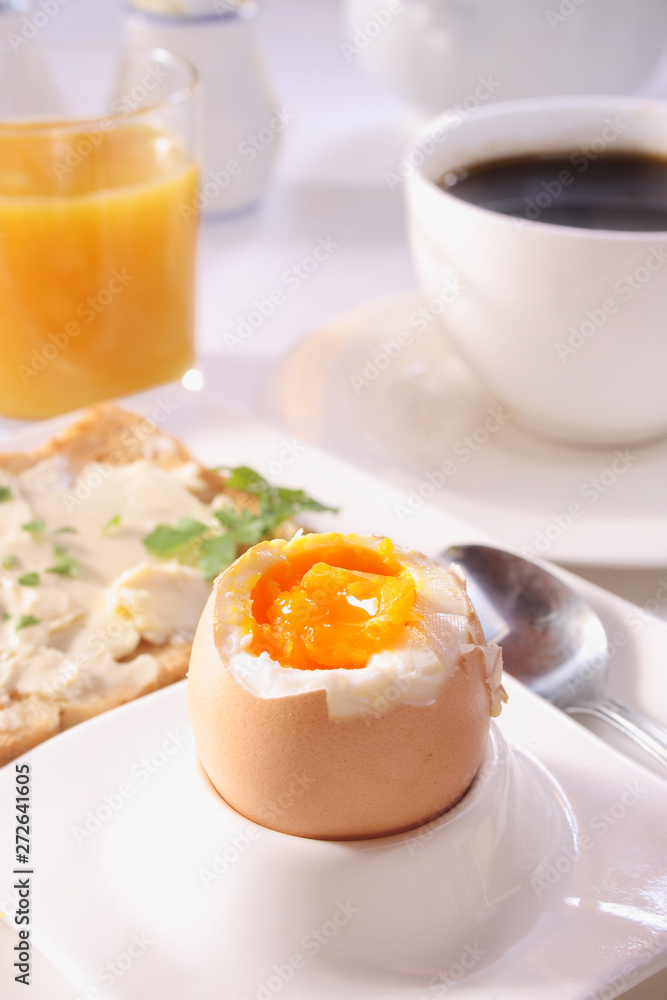 Brakfast table with soft boiled egg. Selective focus Brakfast table with soft boiled egg. Selective focus