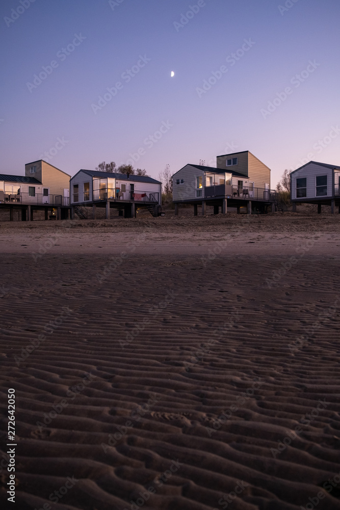 beachhouses at sunset