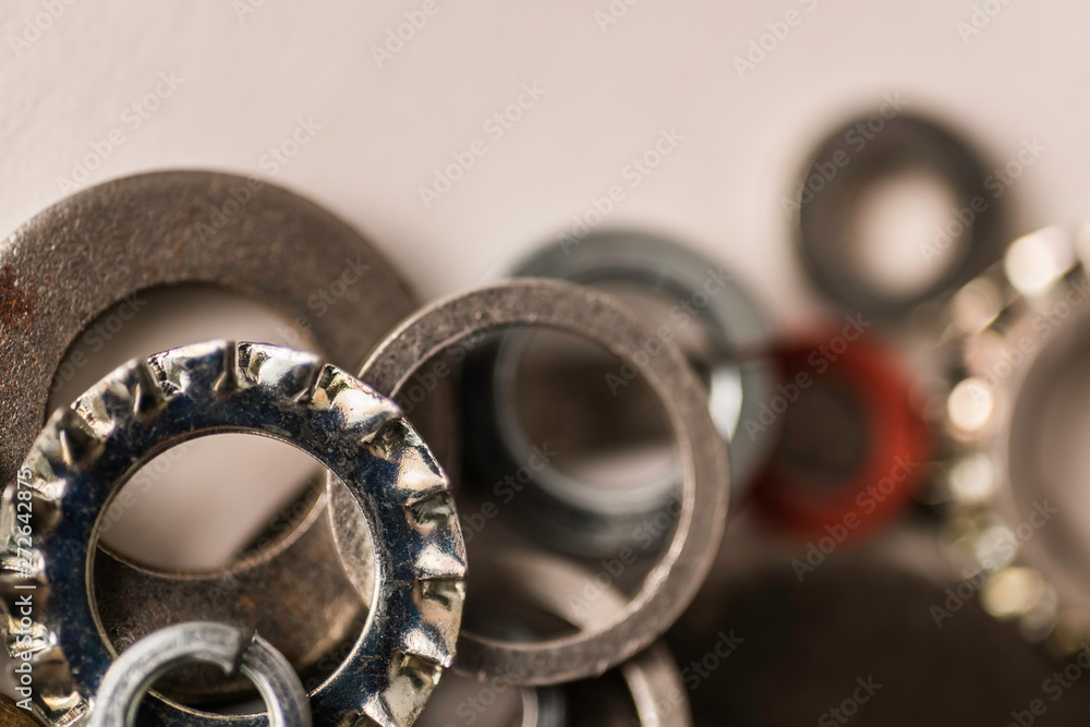 Divers industrial washers and rings. Various colorful washers rings on white background Screw washer Divers industrial washers and rings. Various colorful washers rings on white background Screw washer