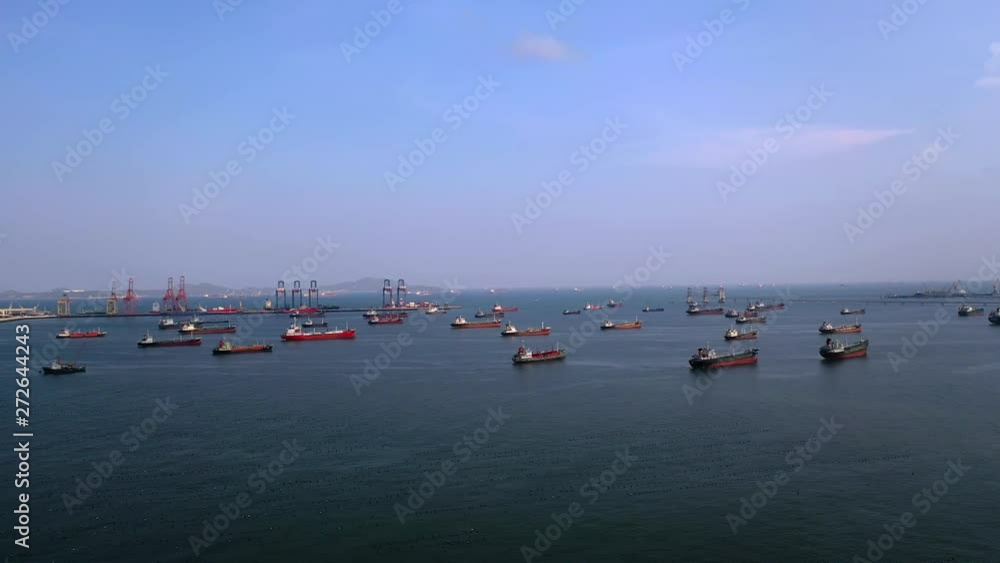 Aerial top view of the ship carrying the lpg and oil tanker in the sea port. For energy export and import business for transportation Aerial top view of the ship carrying the lpg and oil tanker in the sea port. For energy export and import business for transportation