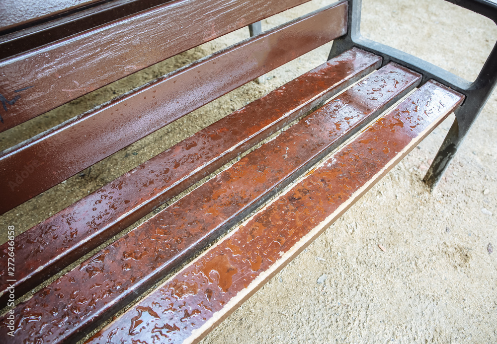 Wet bench after rain standing in the park. Wet bench after rain standing in the park.