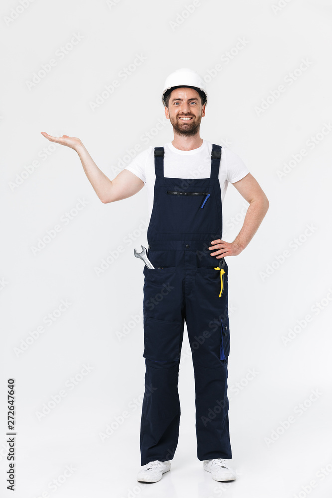 Full length portrait of a handsome bearded builder man Full length portrait of a handsome bearded builder man