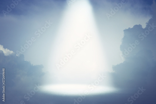A picture of a celestial ray of light in the sky. Concept of religion and faith
