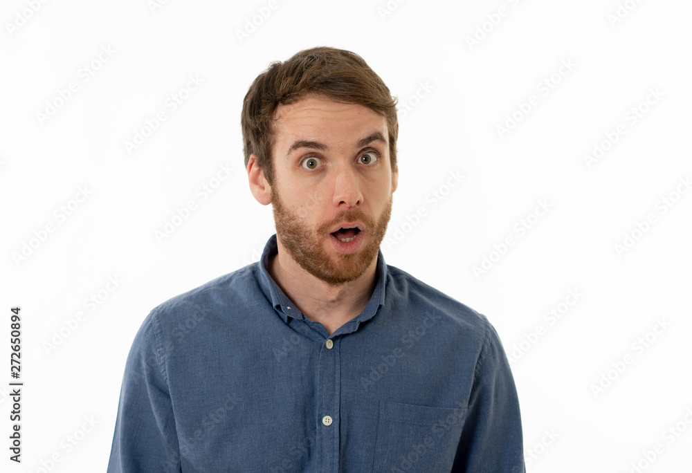 Happy young attractive man shocked with a surprised funny face. Human expressions and emotions. Happy young attractive man shocked with a surprised funny face. Human expressions and emotions.
