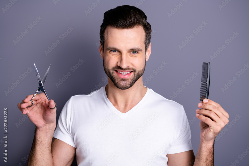 Close up photo amazing he him his macho barber shop stylist brush scissors hands look interested curious customer hairstyle ready make masterpiece wear casual white t-shirt isolated grey background